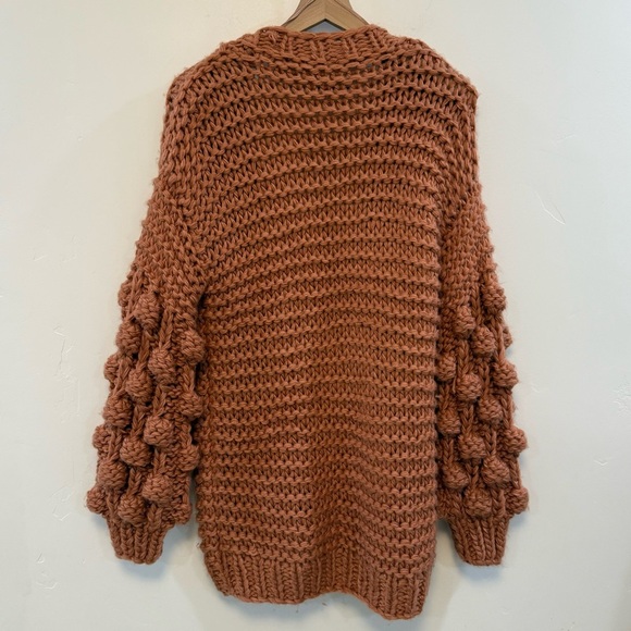 Chunky Knit Hand Made Oversized Cardigan
Sweater Pom Pom Sleeve - Picture 9 of 9
